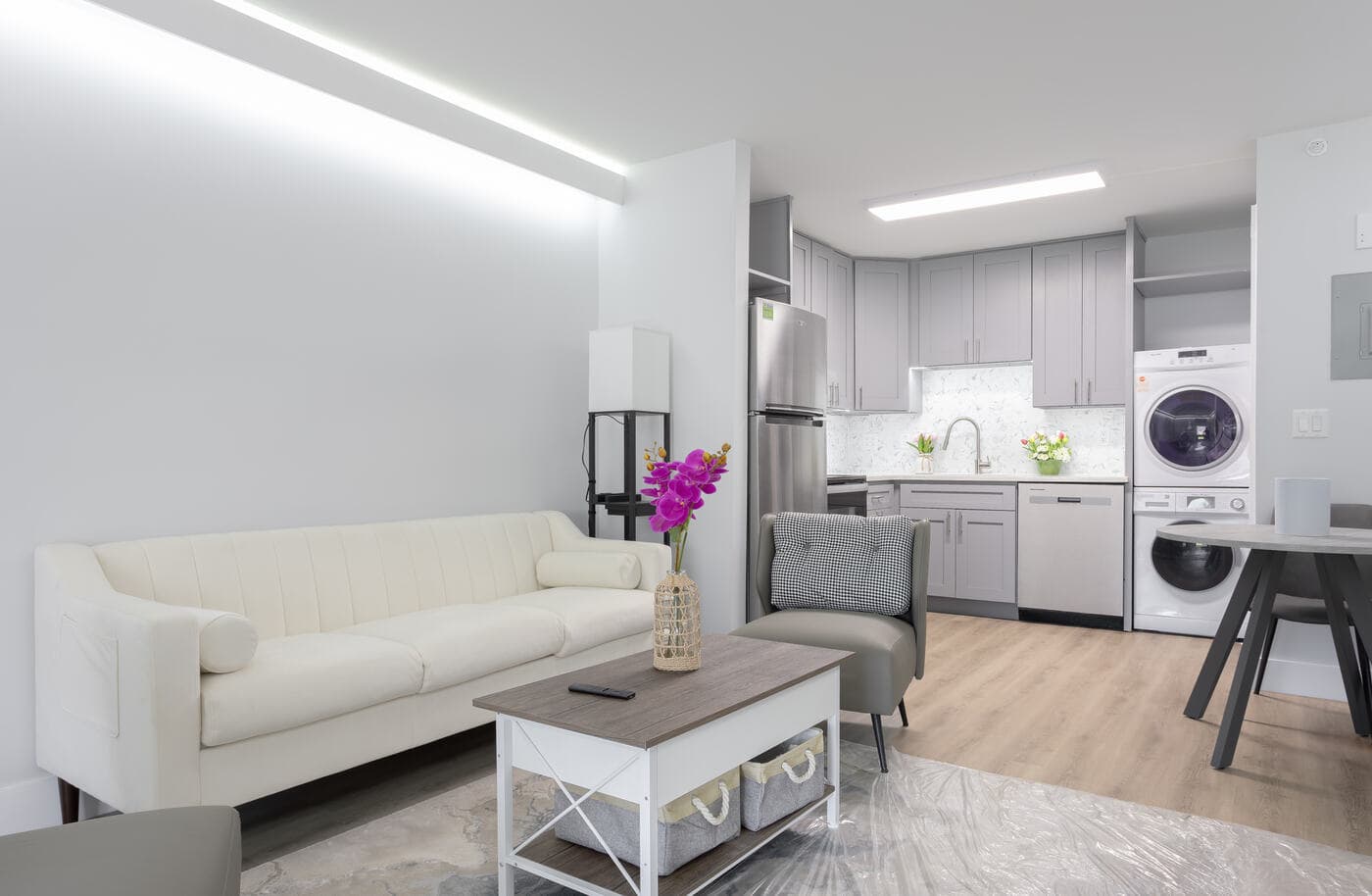 Living room in a one-bedroom home at The Jade