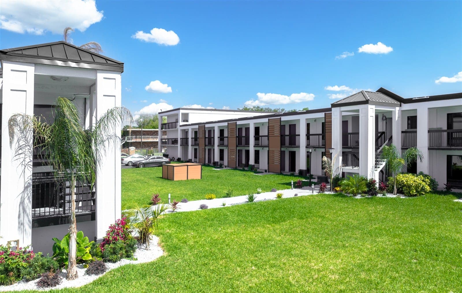 Open lawn between the buildings at The Jade